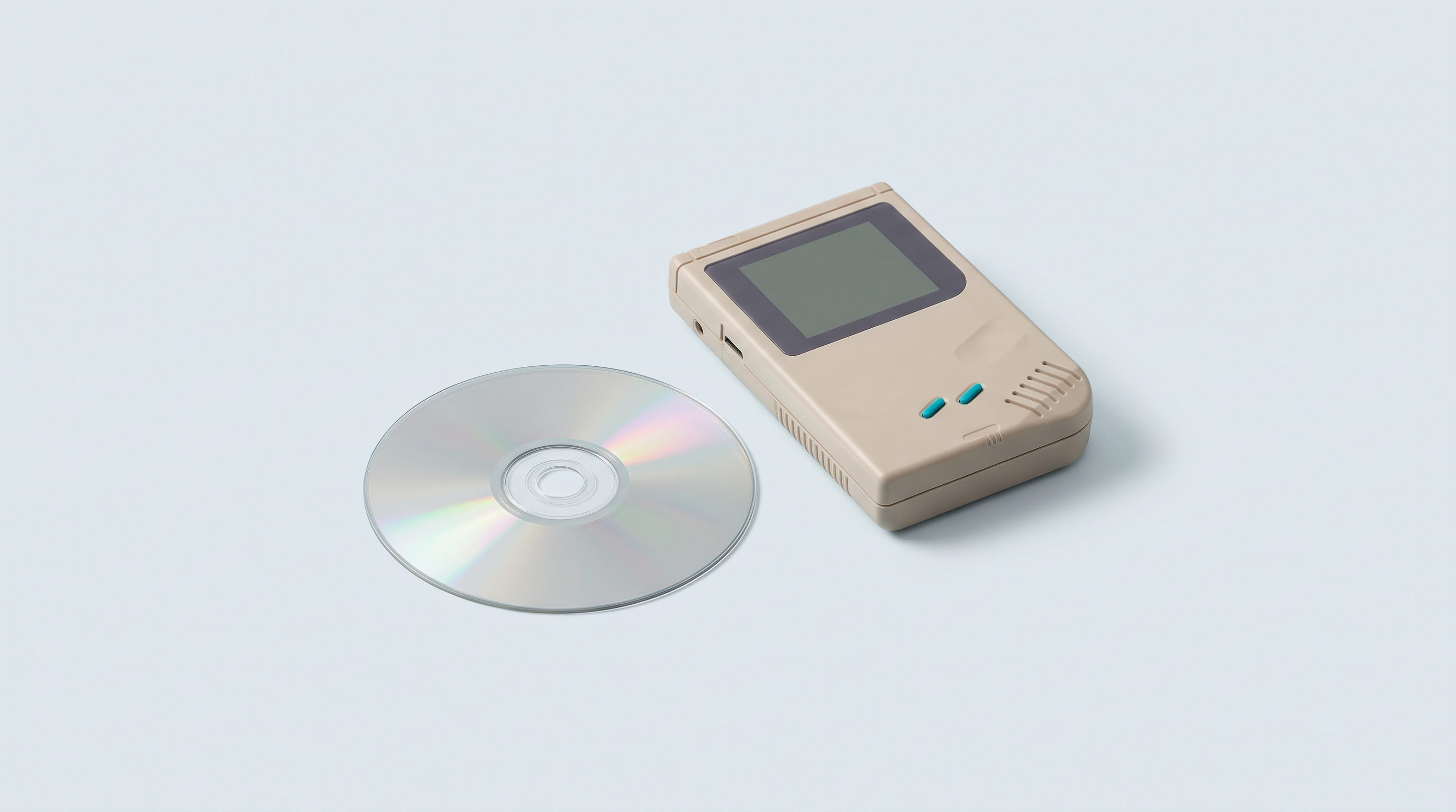 Disque optique argenté sans étiquette posé à plat près d'une console portable rétro
