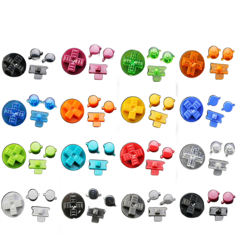 Kit de remplacement réunissant deux boutons ronds et une croix directionnelle en plastique moulé