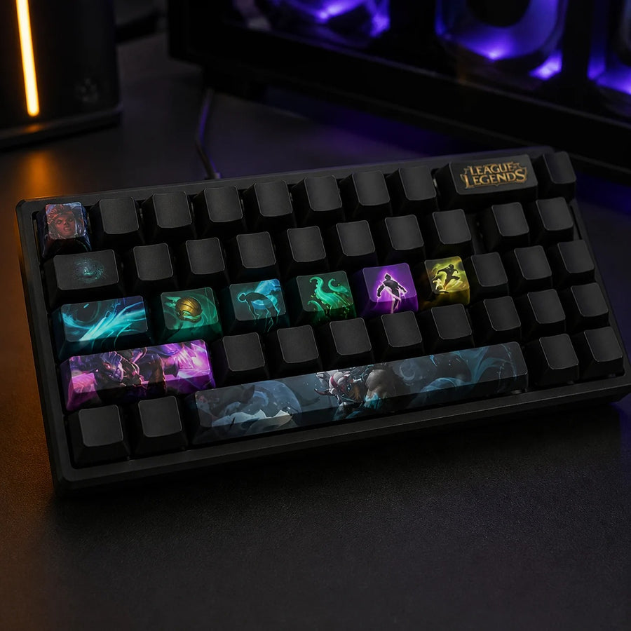 Ornn keycaps fitted on a black mechanical keyboard in front of a gaming PC