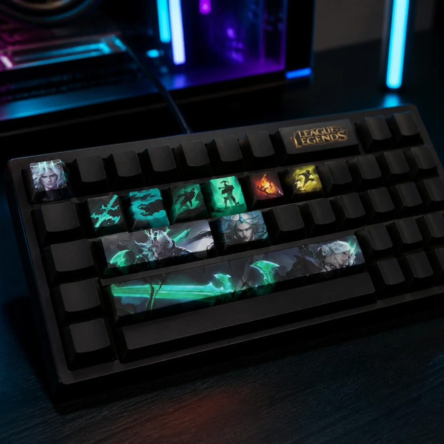 Viego keycaps fitted on a black mechanical keyboard in front of a gaming PC