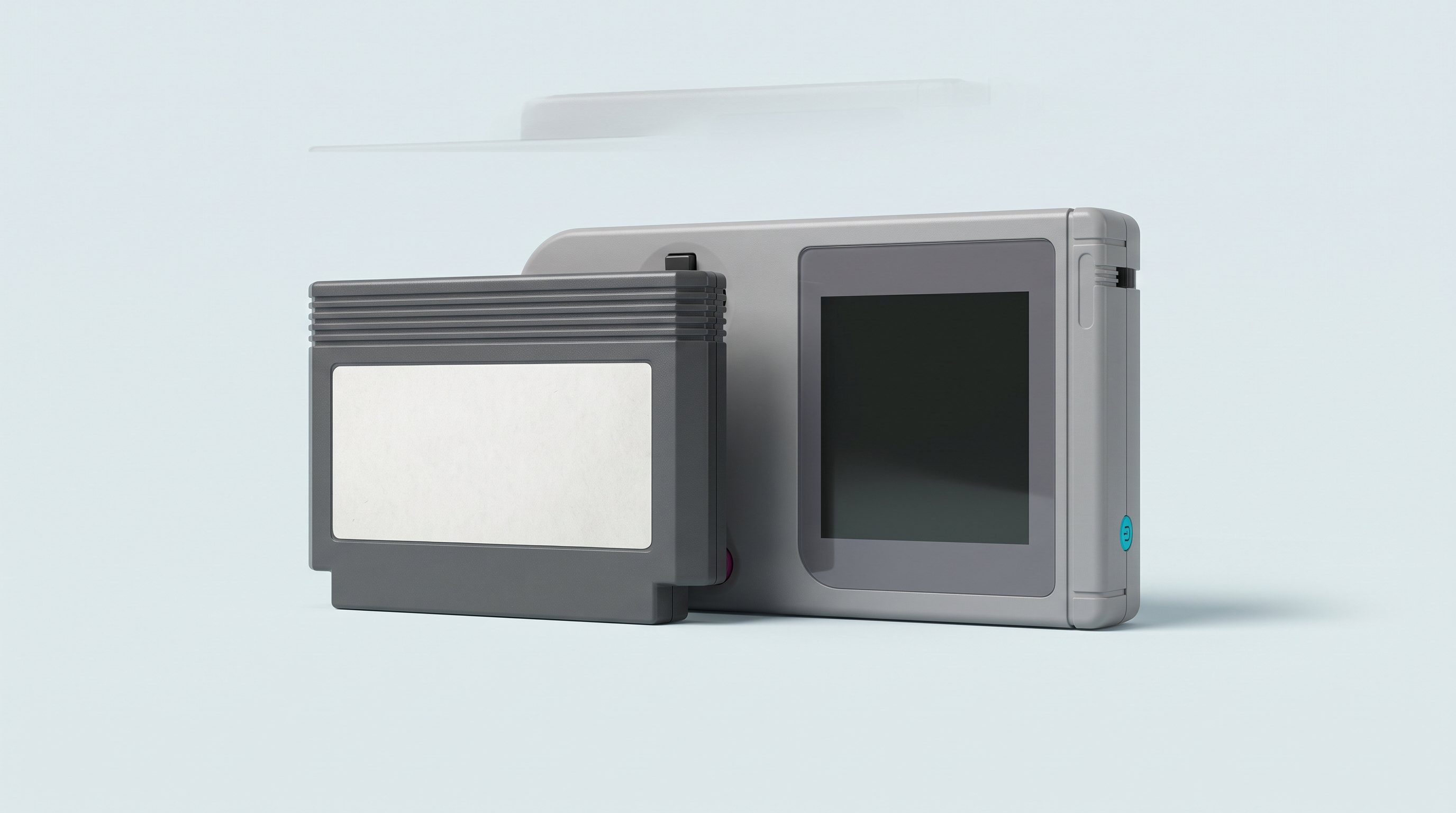 Grosse cartouche de jeu gris foncé dressée près d'une console portable rétro