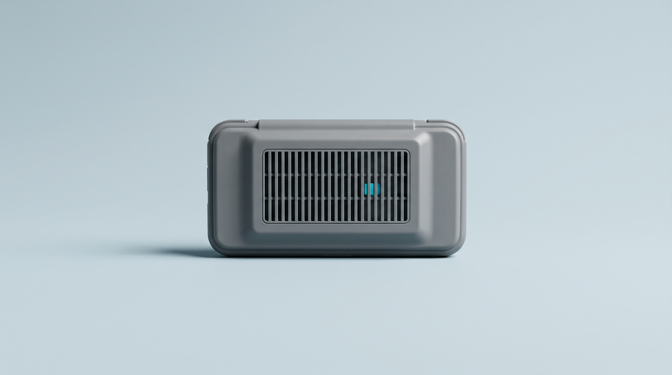 Console portable rétro retournée montrant sa grille de ventilation arrière en détail