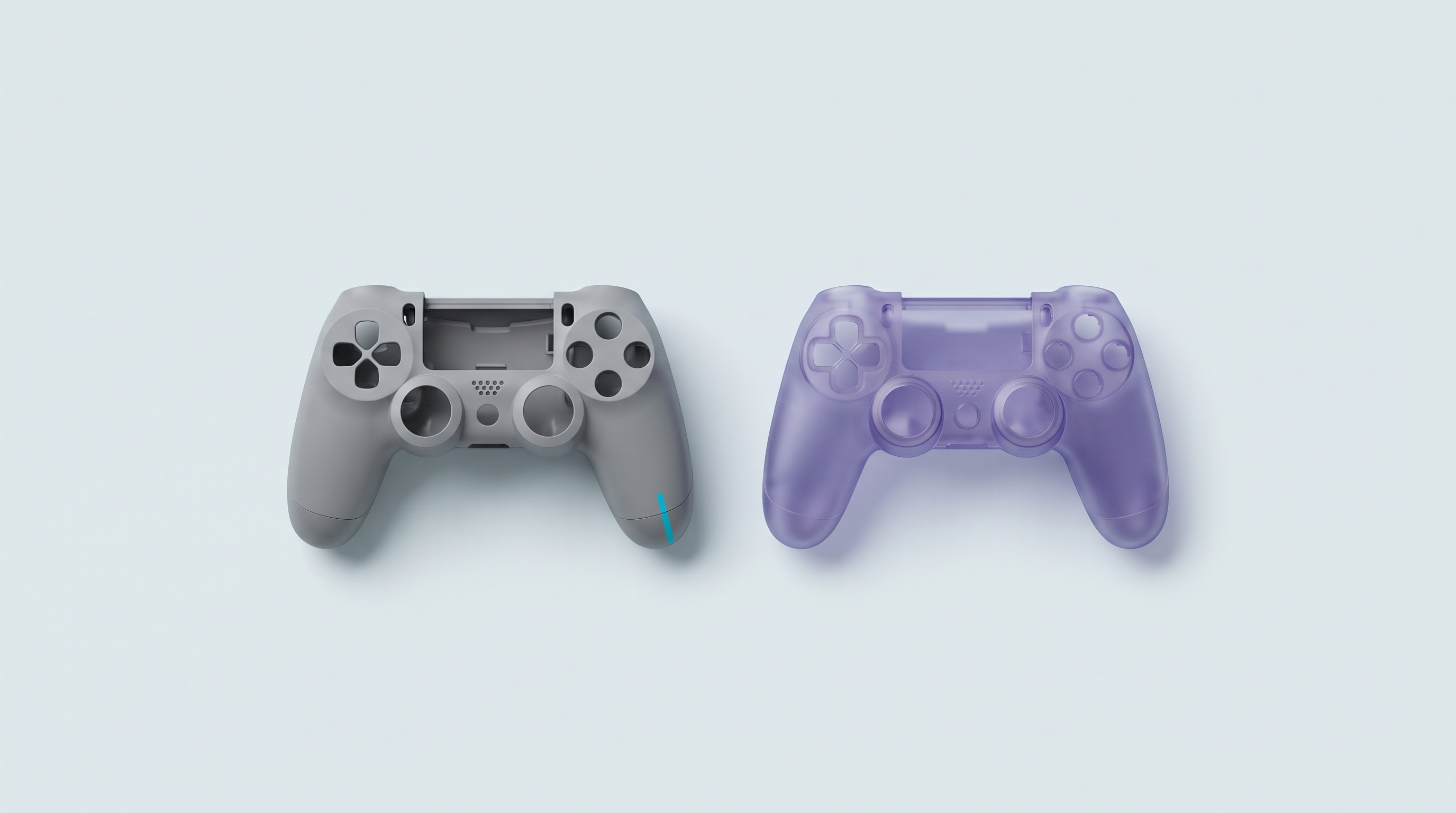 Deux coques de console vides de même forme, une grise et une violette translucide