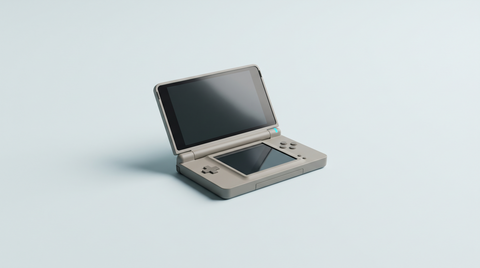 Console portable à clapet à demi ouverte sur sa charnière, écran éteint, vue de trois quarts