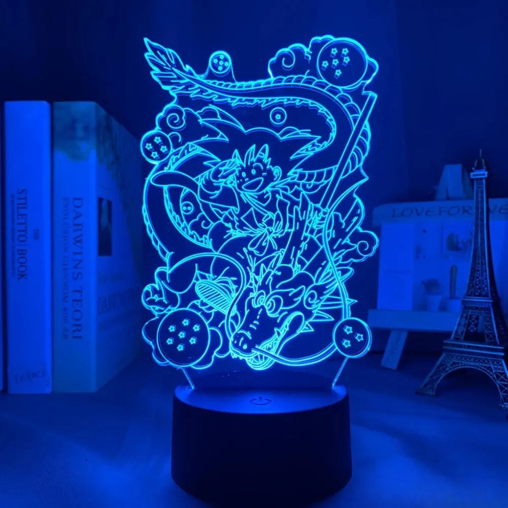 Lampe 3D Goku et Shenron allumée avec lumière bleue.