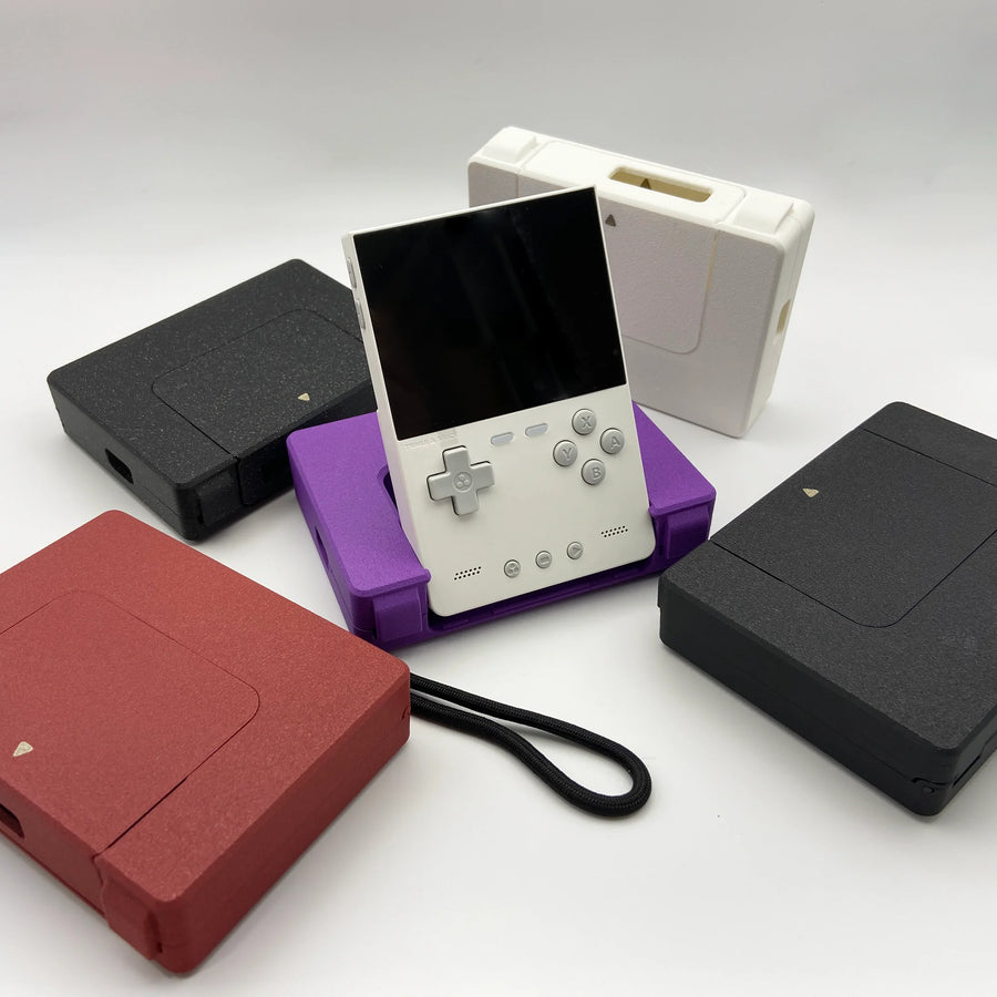 3-in-1 TrimUI Brick cases open, console fitted