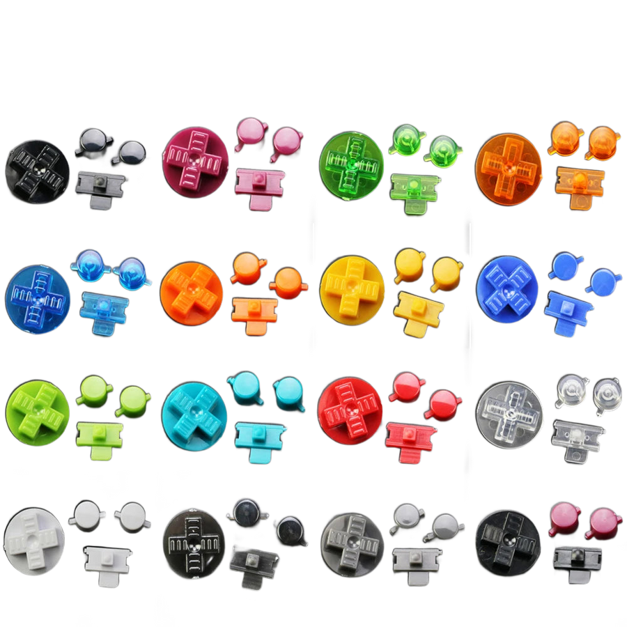 Kit de remplacement réunissant deux boutons ronds et une croix directionnelle en plastique moulé
