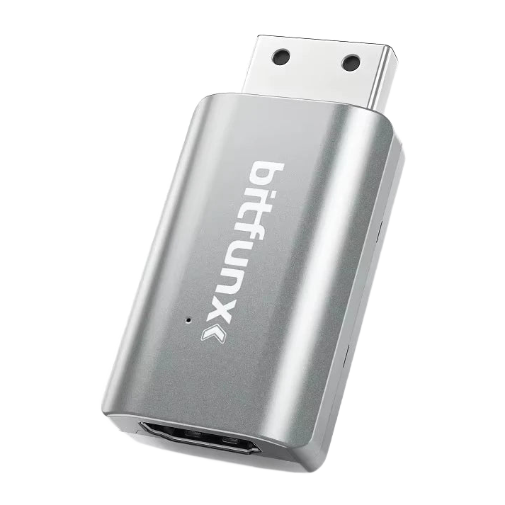 Petit adaptateur vidéo blanc à sortie HDMI, connecteur console visible à l'arrière