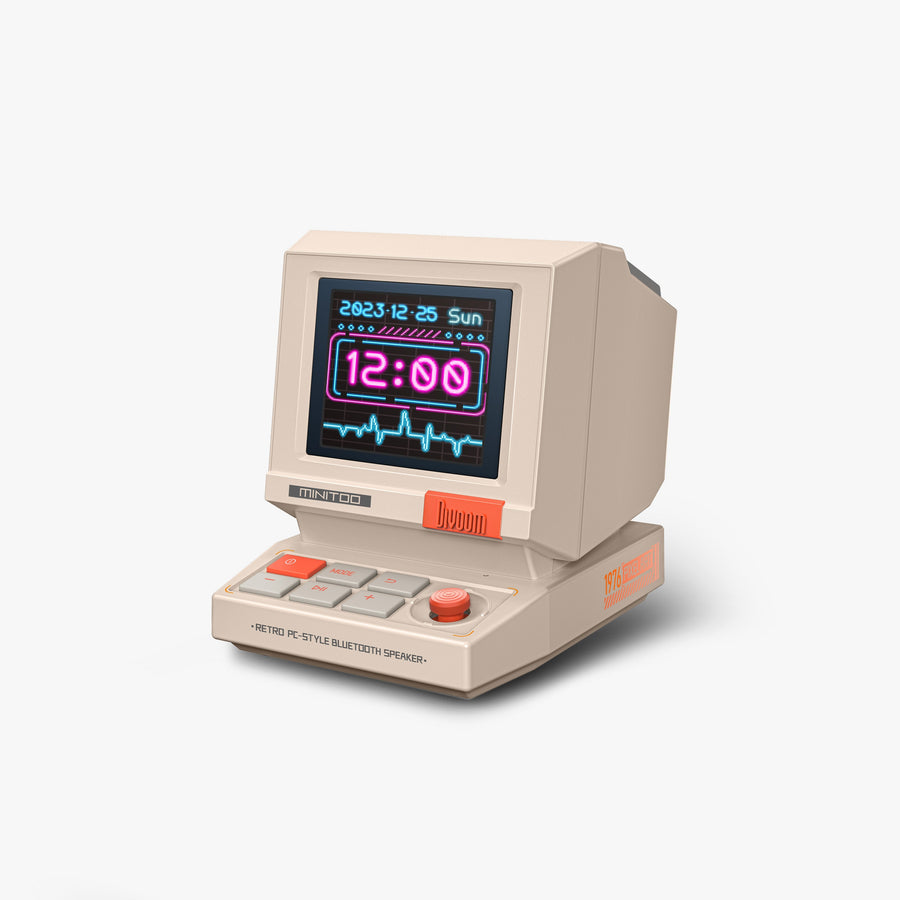 Enceinte Divoom MiniToo affichant l'heure sur son écran pixel